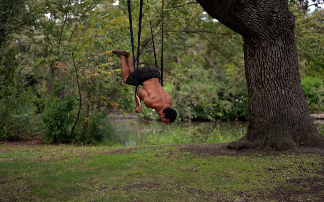 Shoulder Stand on Rings – Tuck